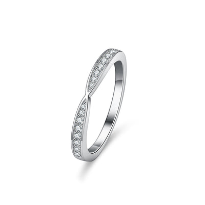 Elegant lady's moissanite engagement ring with a sleek design and sparkling stones on the band