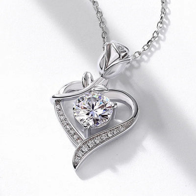 Beautiful sterling silver moissanite pendant in heart shape with rose design and sparkling details