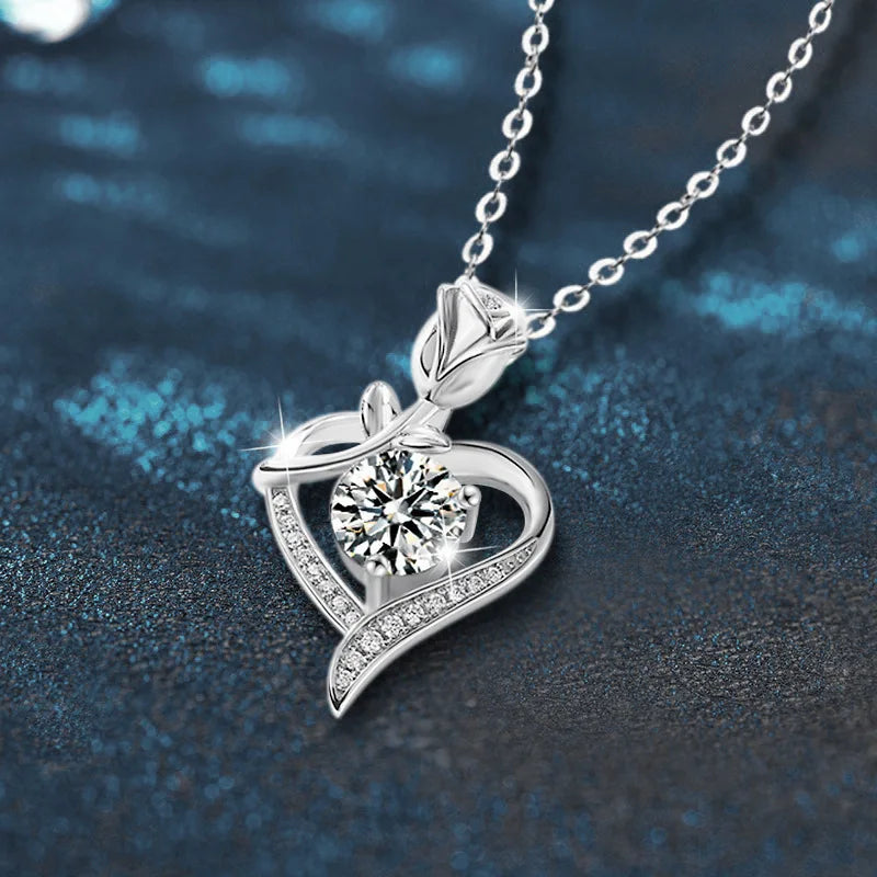 Stylish sterling silver moissanite pendant with heart design and sparkling center stone