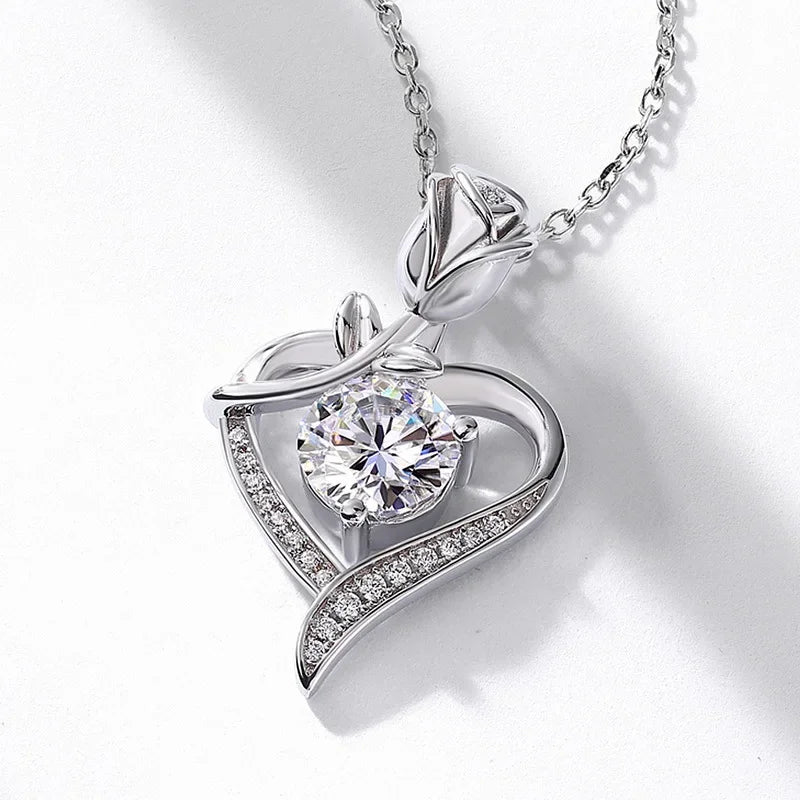 Elegant sterling silver moissanite pendant with rose design and sparkling heart shape