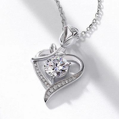 Elegant sterling silver moissanite pendant with rose design and sparkling heart shape