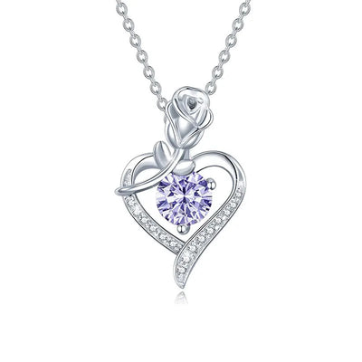 Sterling silver moissanite pendant featuring a heart design with a rose and sparkling stones